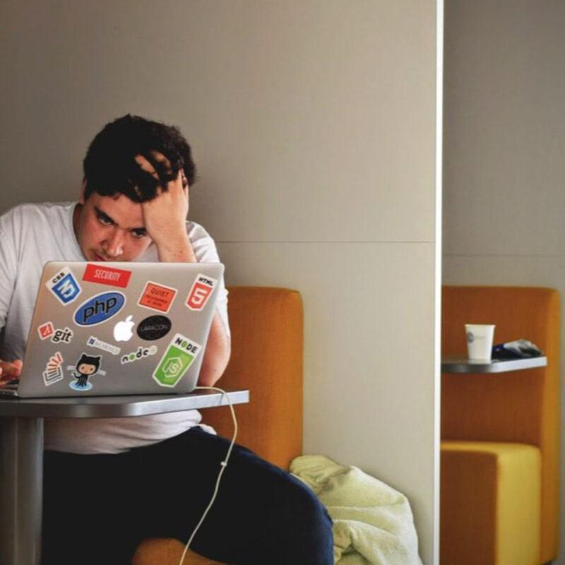 Frustrated Student at Laptop