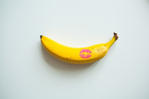 Banana with a lipstick kiss on the peel